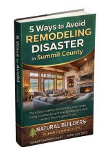 Book titled "5 Ways to Avoid Remodeling Disaster in Summit County" by Natural Builders, featuring an inviting living room interior, emphasizing home remodeling guidance.